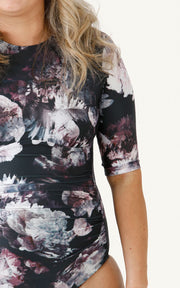1/2 length sleeve sunsafe one piece swimsuit black floral print